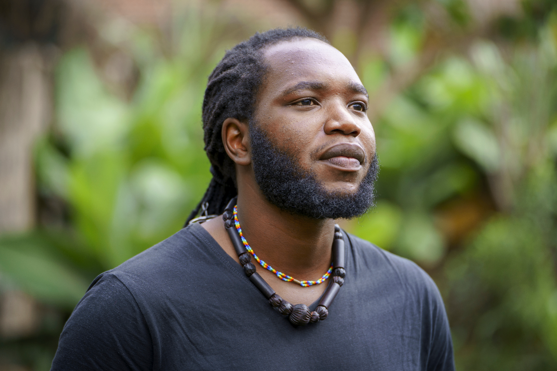 Ruele speaking at a conference